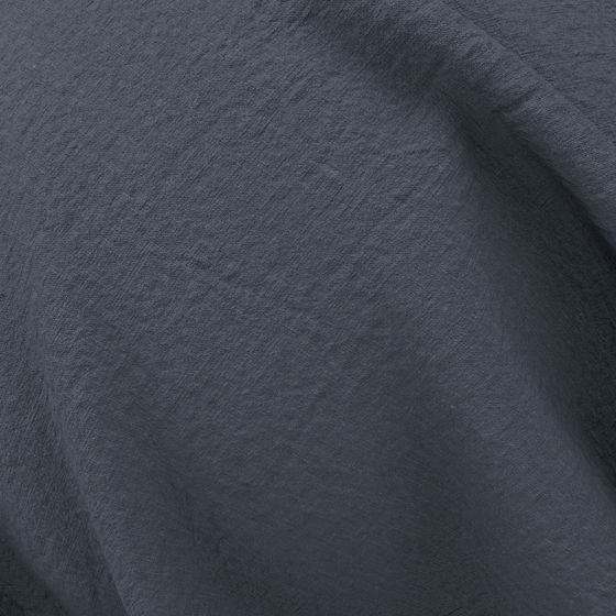 Close-up Shot of a Sheet of Stonewashed Linen in Ink Colour