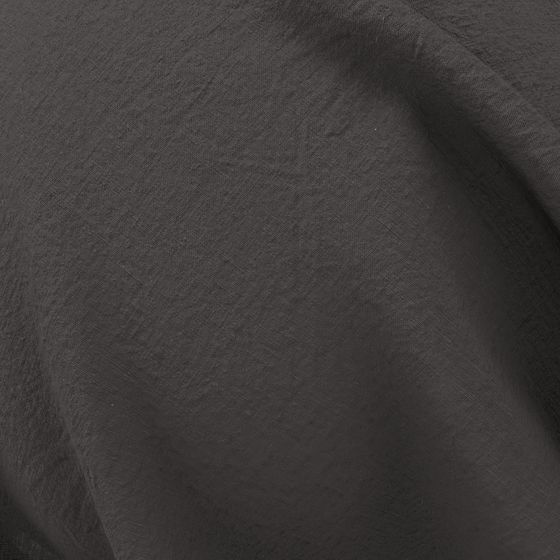 Close-up Shot of a Sheet of Stonewashed Linen in Onyx Colour